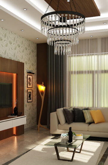 Luxury living room featuring a leaf-patterned wallpaper, a large white L-shaped sectional sofa, and a grand crystal tiered chandelier.
