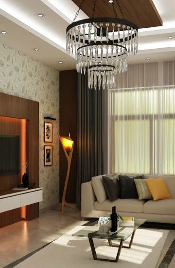 Luxury living room featuring a leaf-patterned wallpaper, a large white L-shaped sectional sofa, and a grand crystal tiered chandelier.