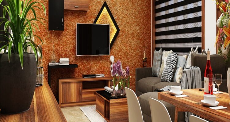 Modern living room interior design with textured accent wall, wooden TV unit and dining area by St Mary’s Interiors Kerala