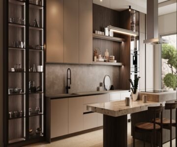 Contemporary kitchen design with taupe cabinets, a marble waterfall island, and floor-to-ceiling fluted glass display shelving with integrated accent lighting
